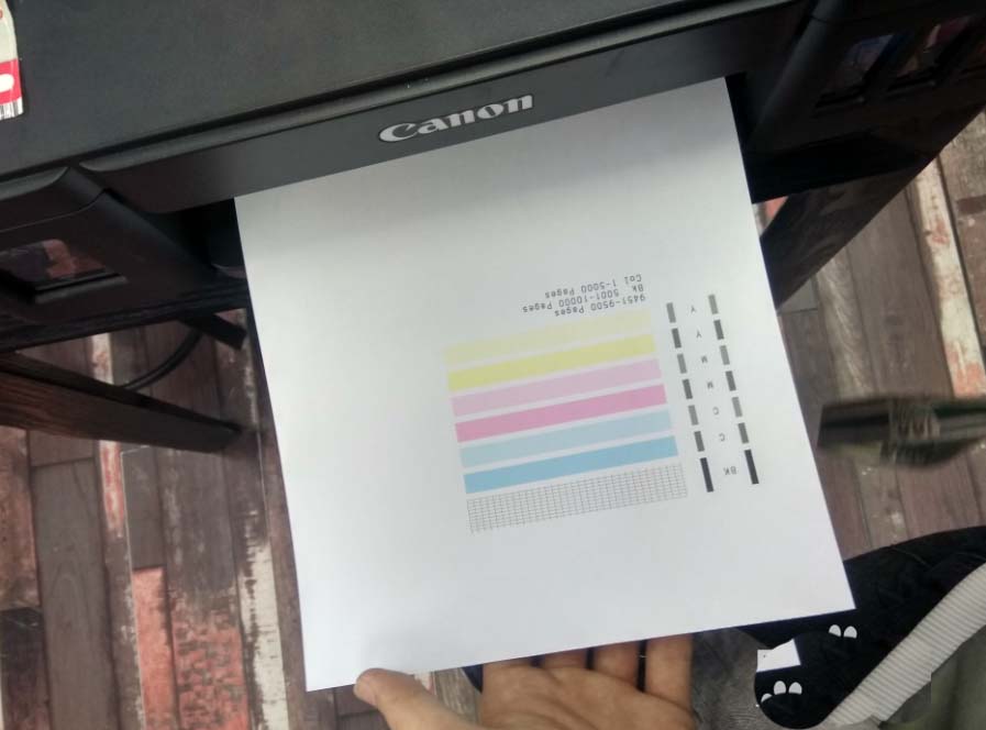 佳能G1810打印机怎么抽墨水?