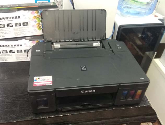 佳能G1810打印机怎么抽墨水?